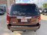 2009 Maroon /Black Honda Pilot EX-L 4WD (5FNYF48569B) with an 3.5L V6 SOHC 24V engine, 5A transmission, located at 1501 West 15th St., Houston, 77008, (713) 869-2925, 29.797941, -95.411789- Photo#4