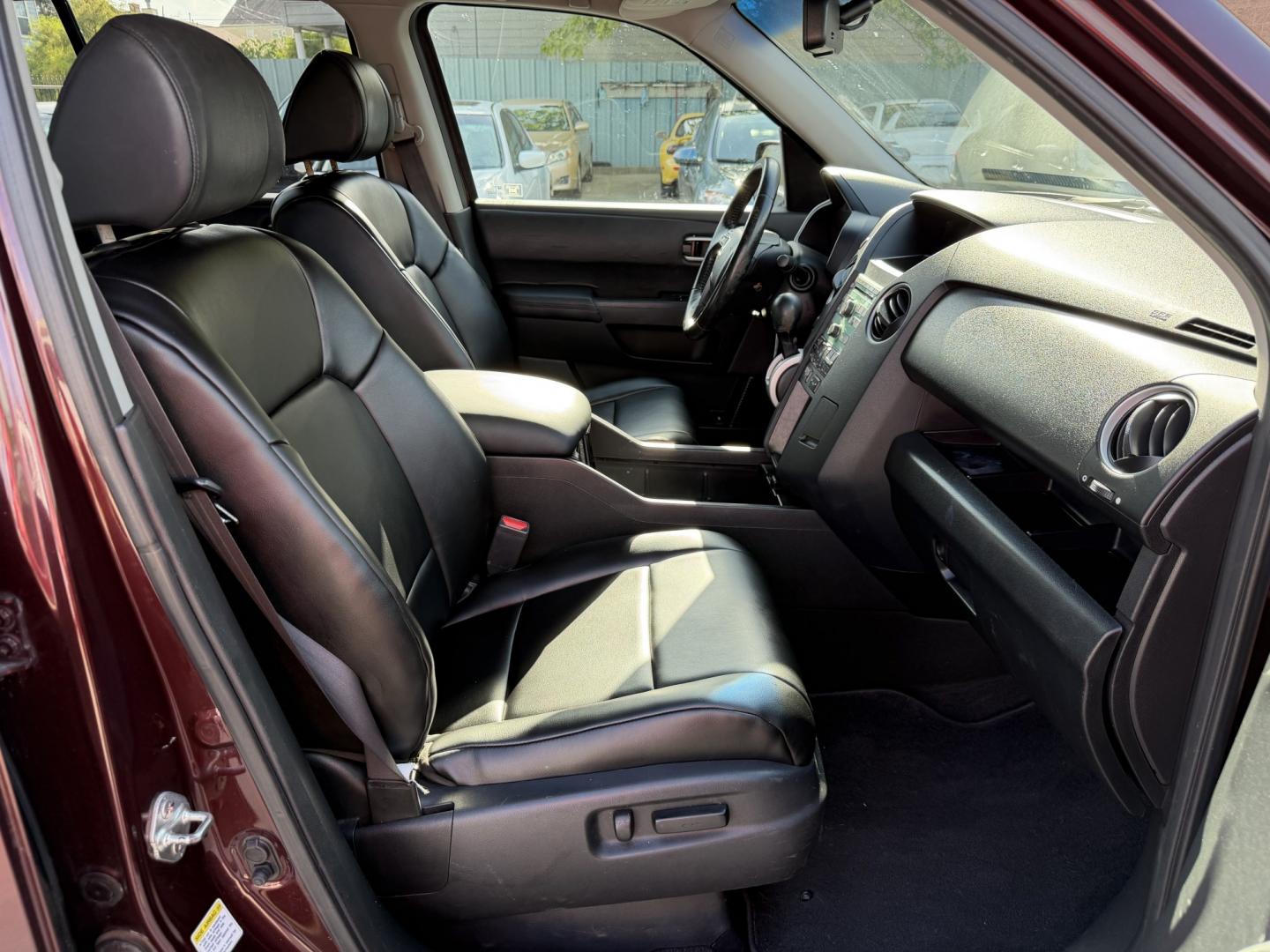 2009 Maroon /Black Honda Pilot EX-L 4WD (5FNYF48569B) with an 3.5L V6 SOHC 24V engine, 5A transmission, located at 1501 West 15th St., Houston, 77008, (713) 869-2925, 29.797941, -95.411789- Photo#7