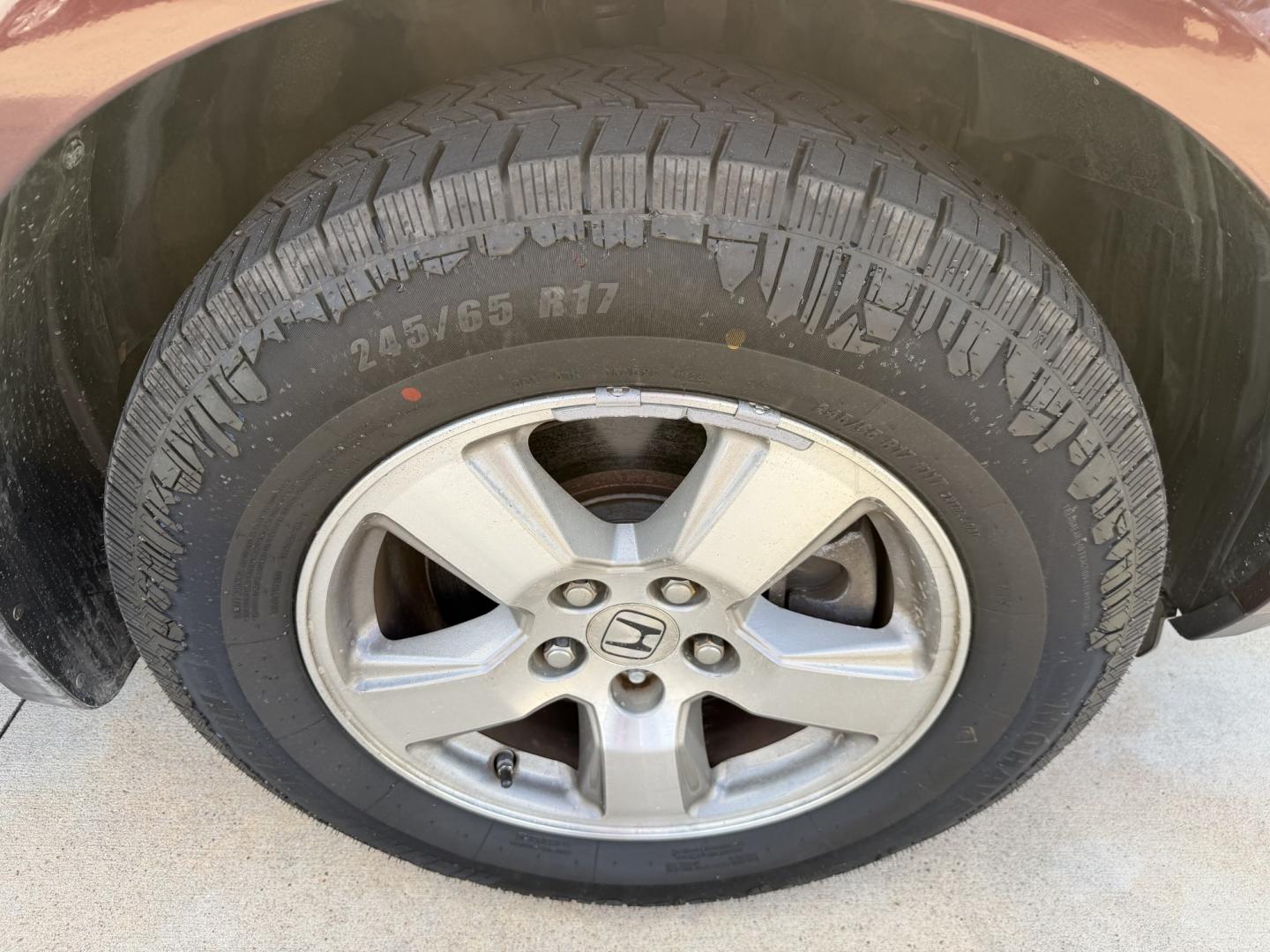 2009 Maroon /Black Honda Pilot EX-L 4WD (5FNYF48569B) with an 3.5L V6 SOHC 24V engine, 5A transmission, located at 1501 West 15th St., Houston, 77008, (713) 869-2925, 29.797941, -95.411789- Photo#16