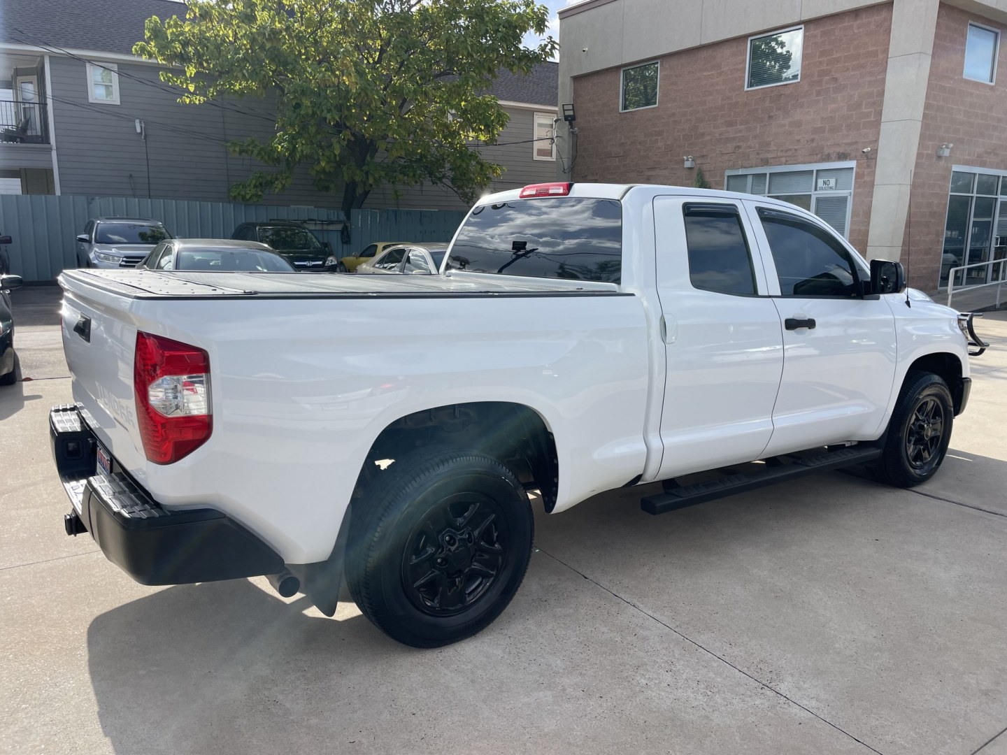2019 White /Silver Toyota Tundra SR 4.6L V8 Double Cab 2WD (5TFRM5F12KX) with an 4.6L V8 DOHC 32V engine, 6A transmission, located at 1501 West 15th St., Houston, 77008, (713) 869-2925, 29.797941, -95.411789- Photo#2