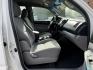 2014 White /Silver Toyota Tacoma Double Cab I4 4AT 2WD (5TFJX4CN2EX) with an 2.7L L4 DOHC 16V engine, 4A transmission, located at 1501 West 15th St., Houston, 77008, (713) 869-2925, 29.797941, -95.411789- Photo#9