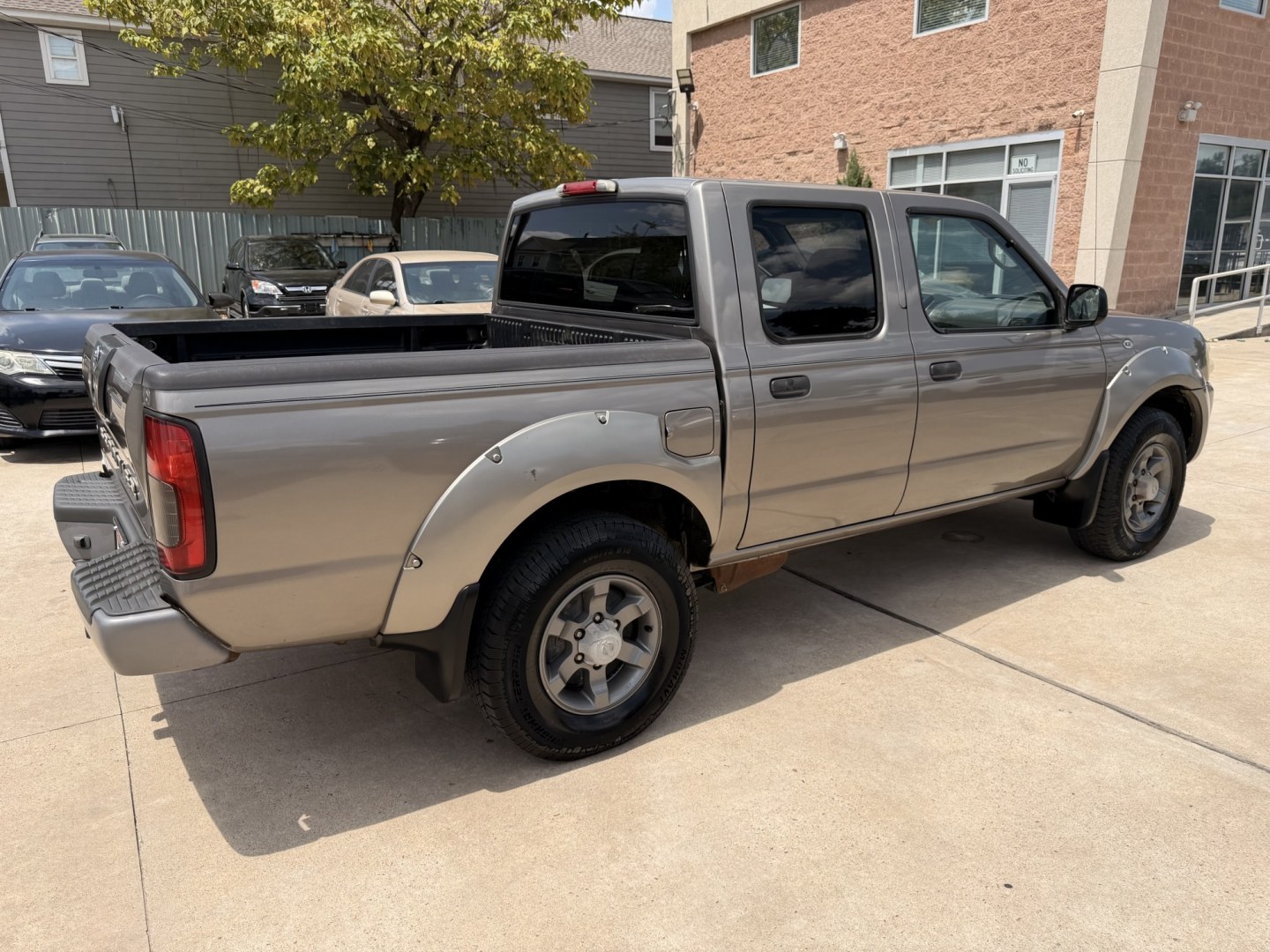 2004 Beige /Gray Nissan Frontier LE-V6 Crew Cab 2WD (1N6ED27T44C) with an 3.3L V6 SOHC 12V engine, 4A OD transmission, located at 1501 West 15th St., Houston, 77008, (713) 869-2925, 29.797941, -95.411789- Photo#2