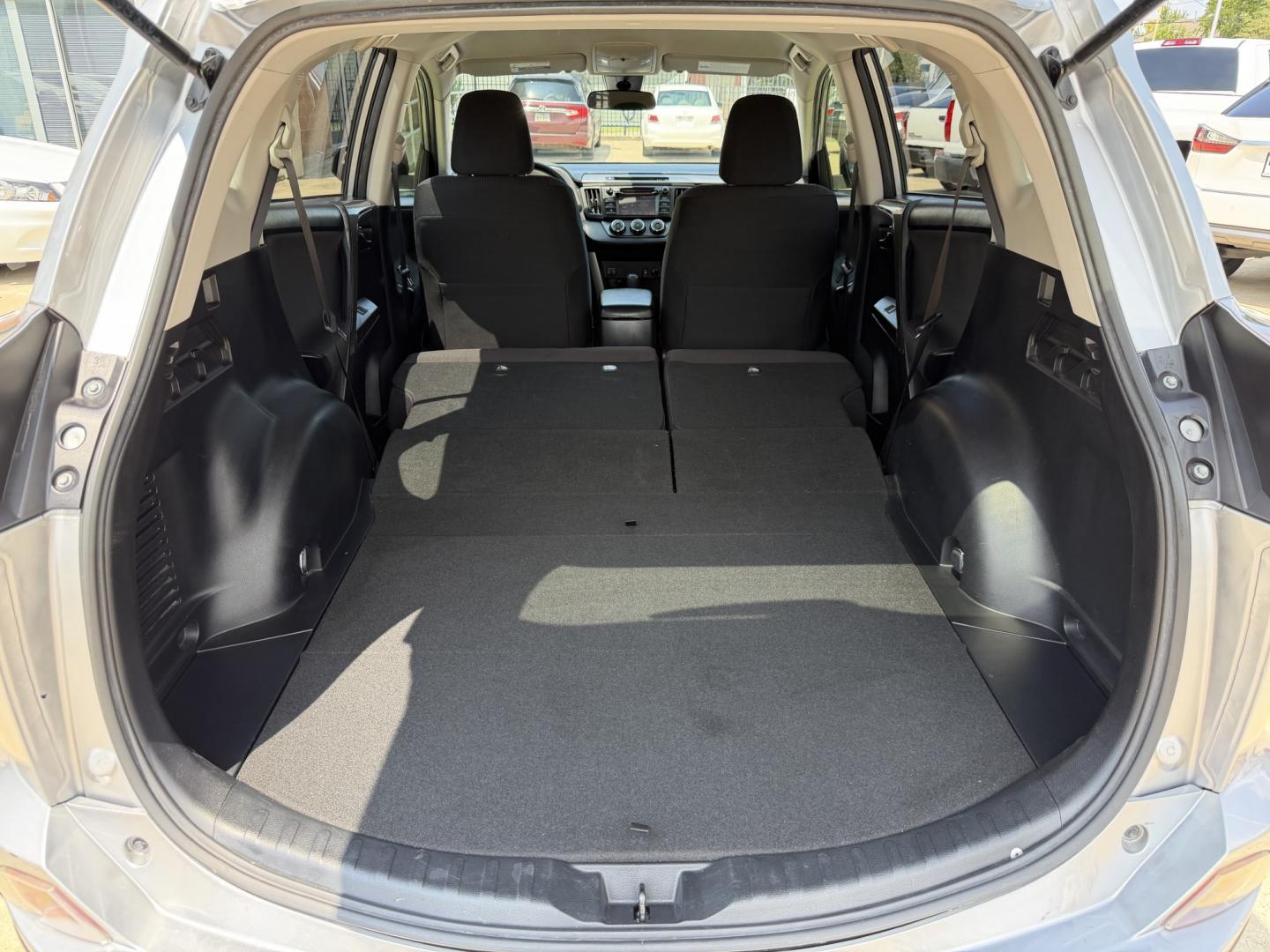 2018 Silver /Black Toyota RAV4 LE FWD (JTMZFREV9JJ) with an 2.5L L4 DOHC 16V engine, 6A transmission, located at 1501 West 15th St., Houston, 77008, (713) 869-2925, 29.797941, -95.411789- Photo#6