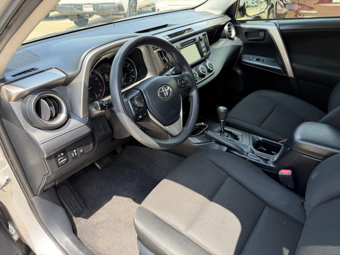 2018 Silver /Black Toyota RAV4 LE FWD (JTMZFREV9JJ) with an 2.5L L4 DOHC 16V engine, 6A transmission, located at 1501 West 15th St., Houston, 77008, (713) 869-2925, 29.797941, -95.411789- Photo#11