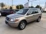 2004 Gold /Tan Honda Pilot EX (2HKYF18454H) with an 3.5L V6 SOHC 24V engine, 5A OD transmission, located at 1501 West 15th St., Houston, 77008, (713) 869-2925, 29.797941, -95.411789- Photo#0