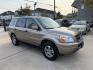2004 Gold /Tan Honda Pilot EX (2HKYF18454H) with an 3.5L V6 SOHC 24V engine, 5A OD transmission, located at 1501 West 15th St., Houston, 77008, (713) 869-2925, 29.797941, -95.411789- Photo#2