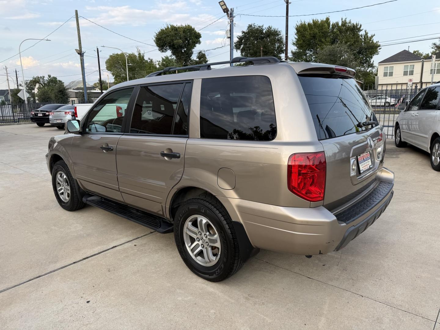 2004 Gold /Tan Honda Pilot EX (2HKYF18454H) with an 3.5L V6 SOHC 24V engine, 5A OD transmission, located at 1501 West 15th St., Houston, 77008, (713) 869-2925, 29.797941, -95.411789- Photo#5
