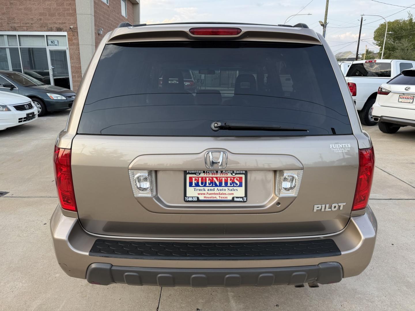 2004 Gold /Tan Honda Pilot EX (2HKYF18454H) with an 3.5L V6 SOHC 24V engine, 5A OD transmission, located at 1501 West 15th St., Houston, 77008, (713) 869-2925, 29.797941, -95.411789- Photo#6