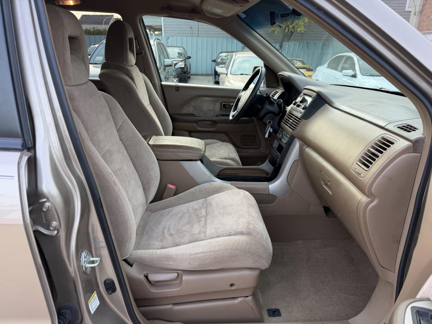 2004 Gold /Tan Honda Pilot EX (2HKYF18454H) with an 3.5L V6 SOHC 24V engine, 5A OD transmission, located at 1501 West 15th St., Houston, 77008, (713) 869-2925, 29.797941, -95.411789- Photo#9
