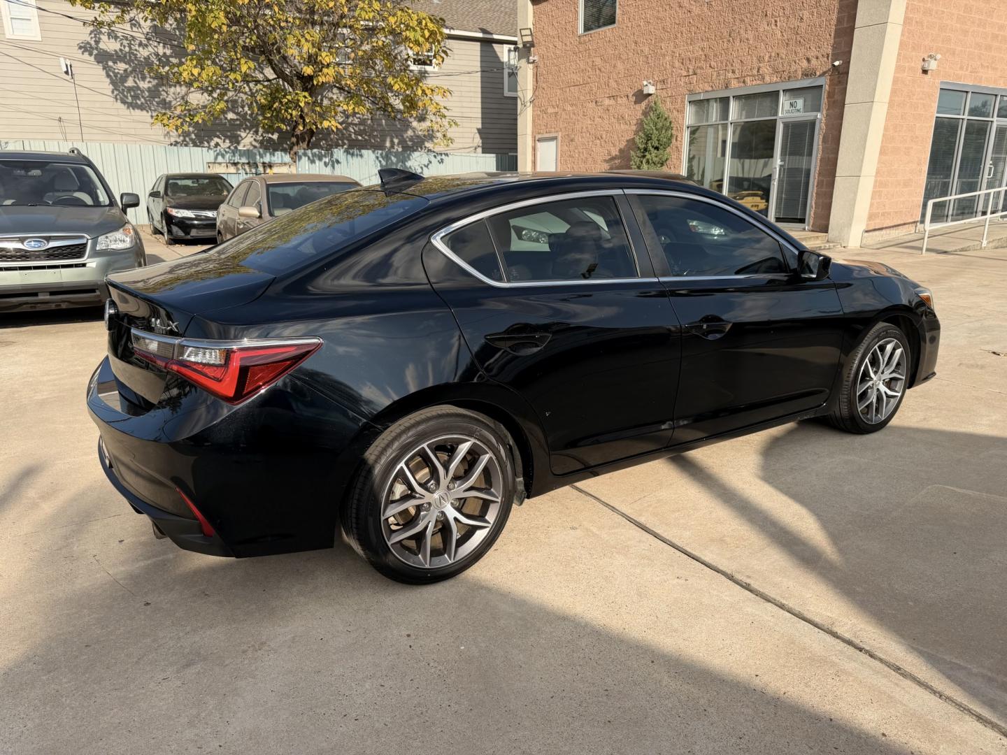 2020 Black /Brown Acura ILX Technology Package (19UDE2F79LA) with an 2.0L L4 16V DOHC engine, 8A transmission, located at 1501 West 15th St., Houston, 77008, (713) 869-2925, 29.797941, -95.411789- Photo#2