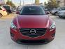 2016 Red /Black Mazda CX-5 Touring (JM3KE2CY5G0) with an 2.5L L4 DOHC 16V engine, 6A transmission, located at 1501 West 15th St., Houston, 77008, (713) 869-2925, 29.797941, -95.411789- Photo#1