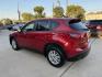 2016 Red /Black Mazda CX-5 Touring (JM3KE2CY5G0) with an 2.5L L4 DOHC 16V engine, 6A transmission, located at 1501 West 15th St., Houston, 77008, (713) 869-2925, 29.797941, -95.411789- Photo#5
