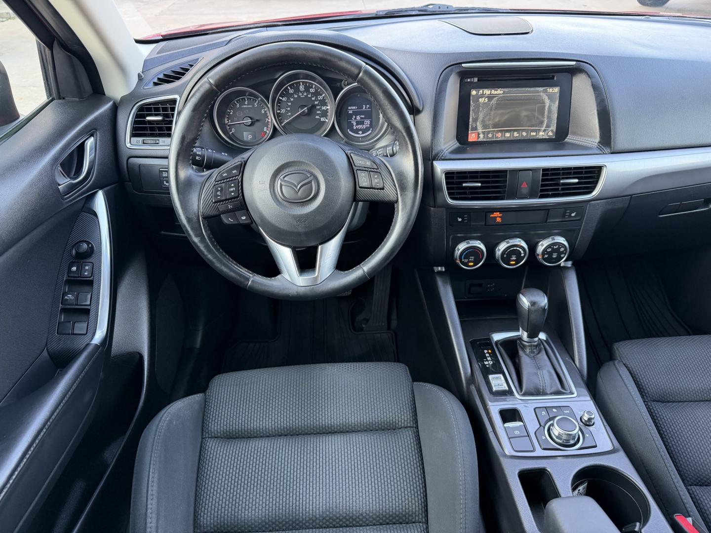 2016 Red /Black Mazda CX-5 Touring (JM3KE2CY5G0) with an 2.5L L4 DOHC 16V engine, 6A transmission, located at 1501 West 15th St., Houston, 77008, (713) 869-2925, 29.797941, -95.411789- Photo#12