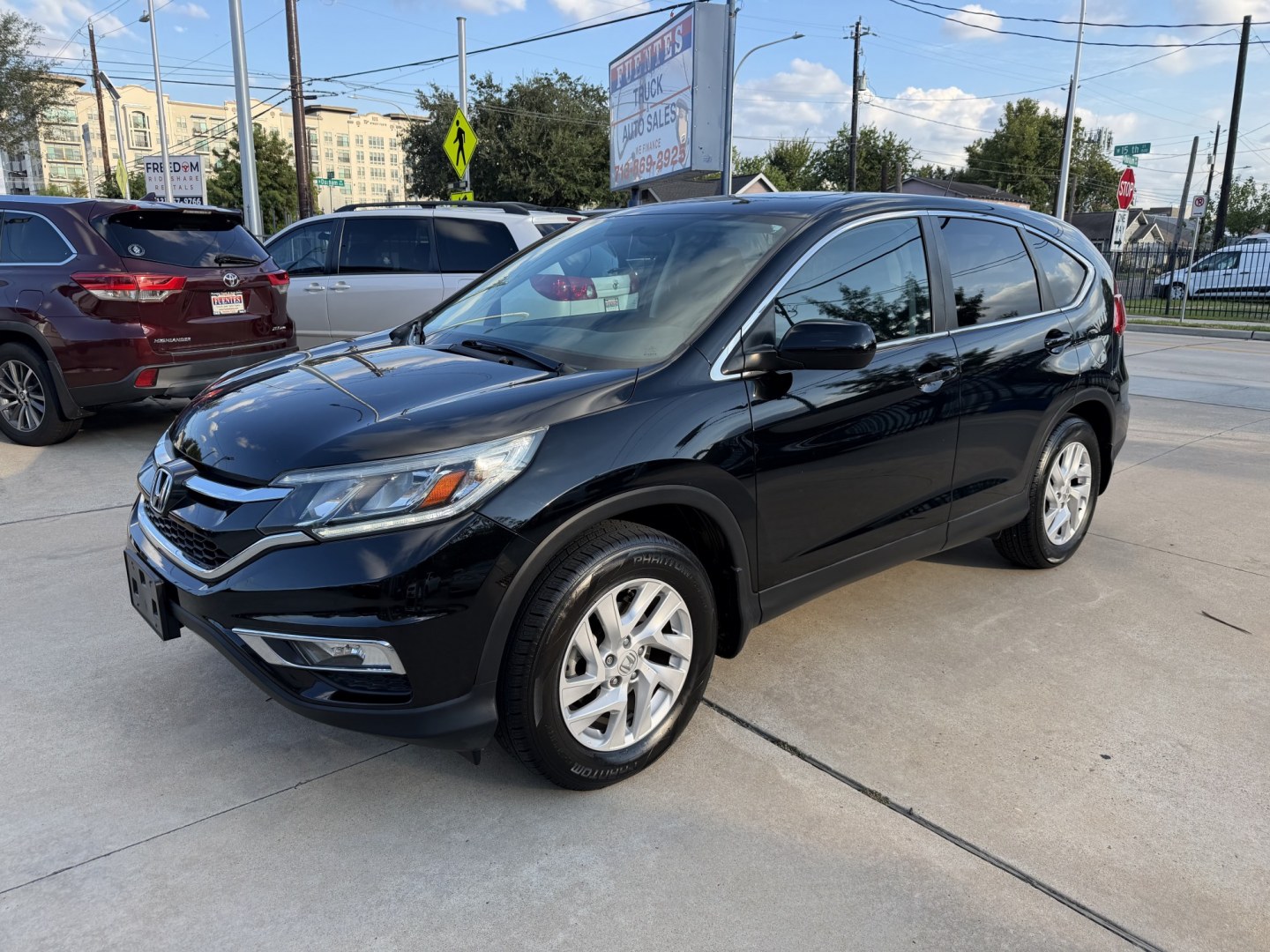 2016 Black /Black Honda CR-V EX 2WD (2HKRM3H5XGH) with an 2.4L L4 DOHC 16V engine, CVT transmission, located at 1501 West 15th St., Houston, 77008, (713) 869-2925, 29.797941, -95.411789- Photo#0