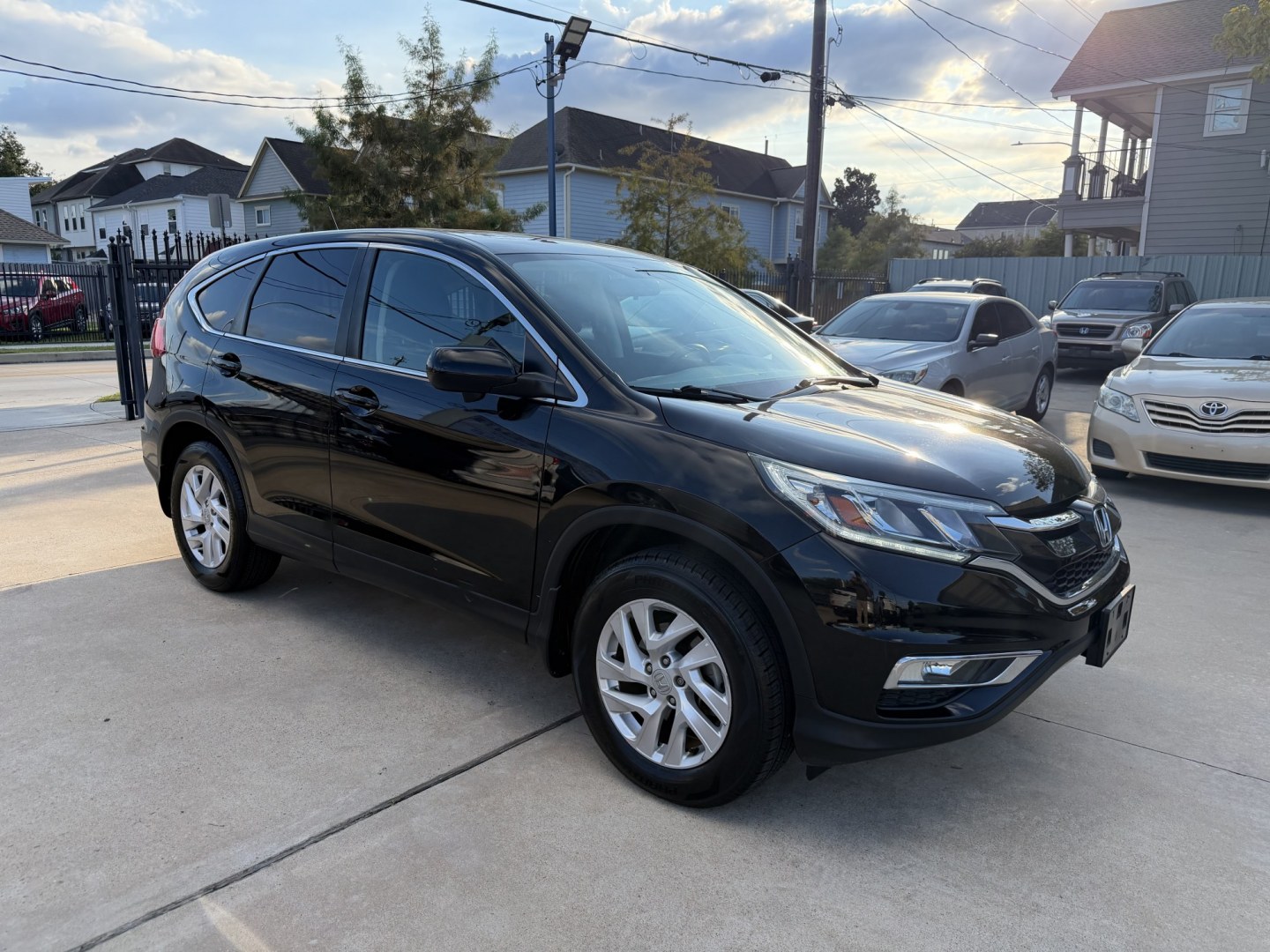 2016 Black /Black Honda CR-V EX 2WD (2HKRM3H5XGH) with an 2.4L L4 DOHC 16V engine, CVT transmission, located at 1501 West 15th St., Houston, 77008, (713) 869-2925, 29.797941, -95.411789- Photo#1