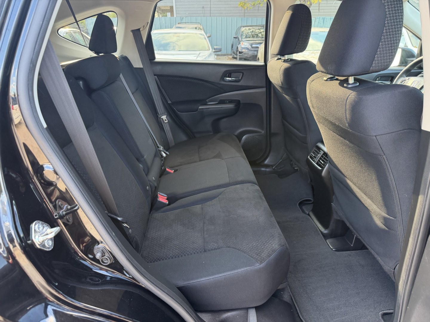 2016 Black /Black Honda CR-V EX 2WD (2HKRM3H5XGH) with an 2.4L L4 DOHC 16V engine, CVT transmission, located at 1501 West 15th St., Houston, 77008, (713) 869-2925, 29.797941, -95.411789- Photo#8