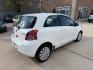 2008 White /Black Toyota Yaris Liftback (JTDJT923185) with an 1.5L L4 DOHC 16V engine, 5 Speed manual transmission, located at 1501 West 15th St., Houston, 77008, (713) 869-2925, 29.797941, -95.411789- Photo#7