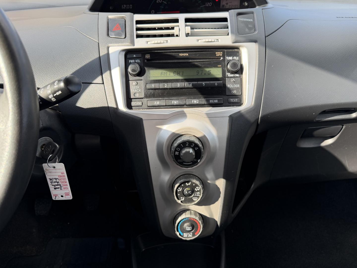 2008 White /Black Toyota Yaris Liftback (JTDJT923185) with an 1.5L L4 DOHC 16V engine, 5 Speed manual transmission, located at 1501 West 15th St., Houston, 77008, (713) 869-2925, 29.797941, -95.411789- Photo#12