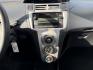 2008 White /Black Toyota Yaris Liftback (JTDJT923185) with an 1.5L L4 DOHC 16V engine, 5 Speed manual transmission, located at 1501 West 15th St., Houston, 77008, (713) 869-2925, 29.797941, -95.411789- Photo#12