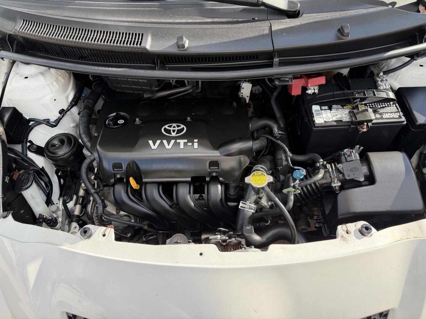 2008 White /Black Toyota Yaris Liftback (JTDJT923185) with an 1.5L L4 DOHC 16V engine, 5 Speed manual transmission, located at 1501 West 15th St., Houston, 77008, (713) 869-2925, 29.797941, -95.411789- Photo#14